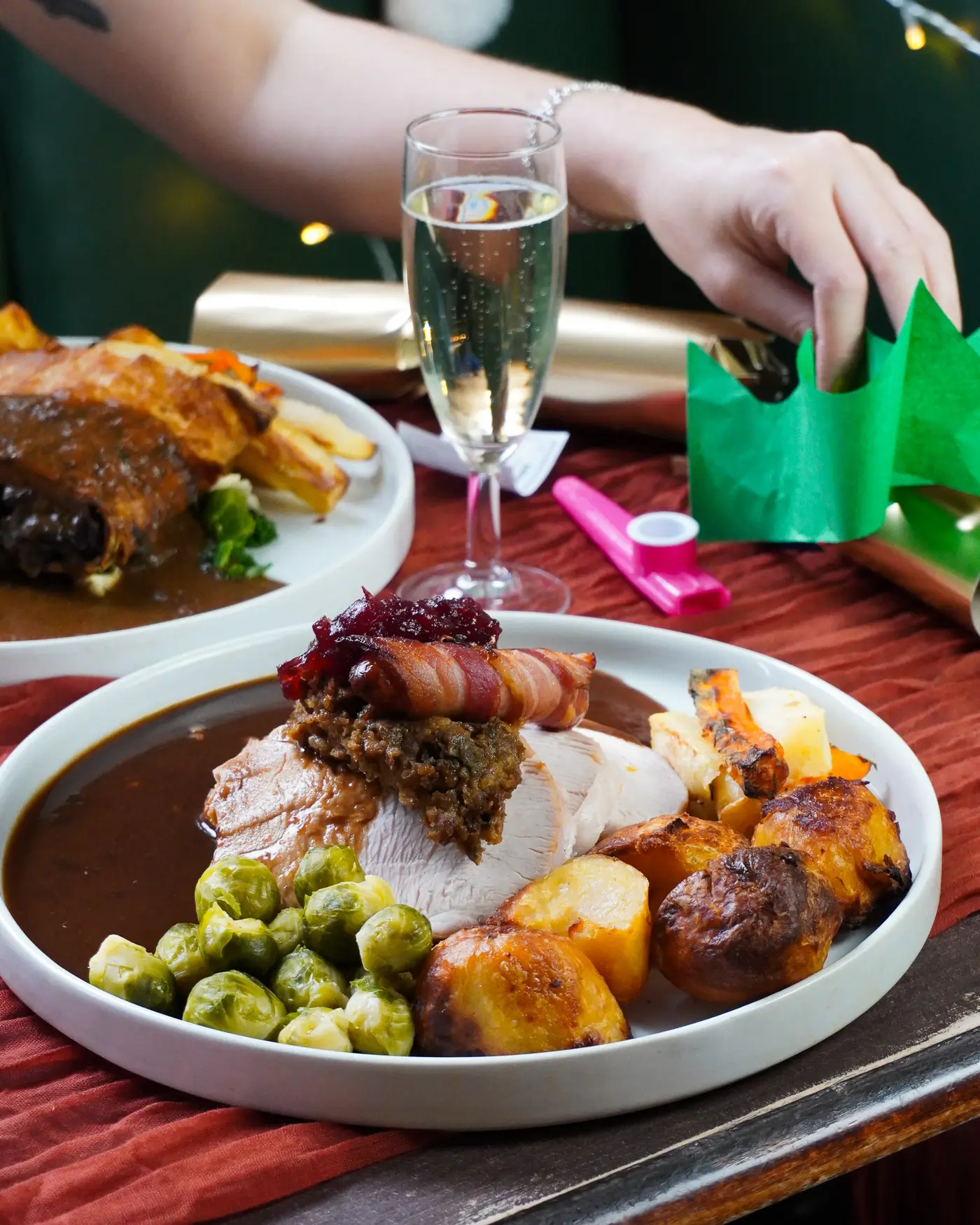Photo of roast turkey dinner with a glass of prosecco